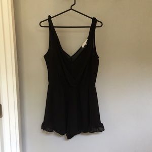 Black romper play suit size medium black